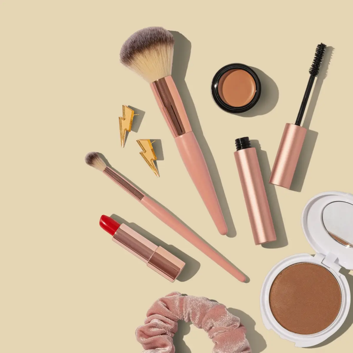 Personal care products arranged on a neutral background