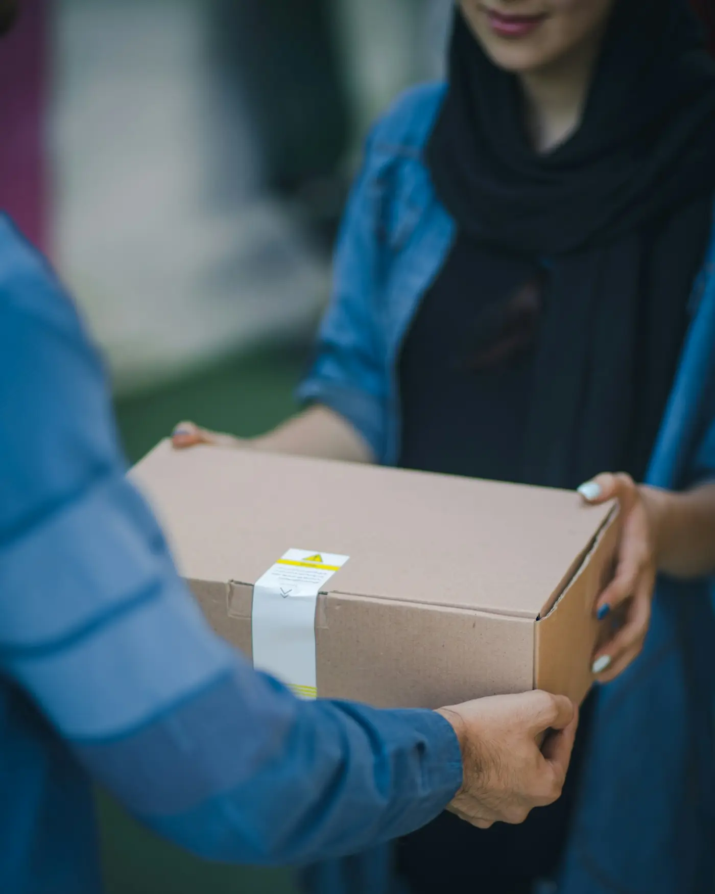 A sealed return parcel with a shipping label